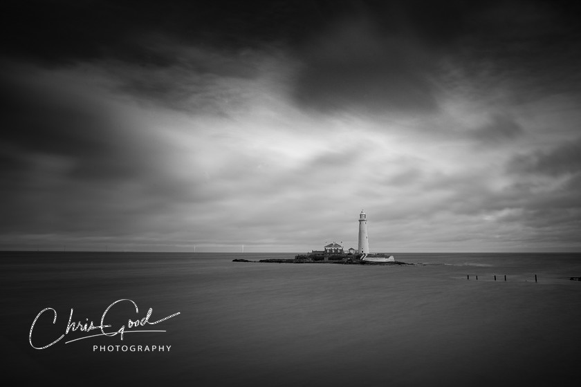 St Marys Lighthouse 
 Keywords: St Mary's, LIghthouse, UK Lighthouse, Black and White photography, BNW, B&W, UK Coast, Coast seacscape, Cloud photography, Drama, Dramatic sky